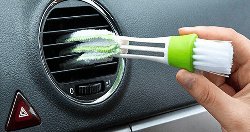 car vents cleaning by foam brush